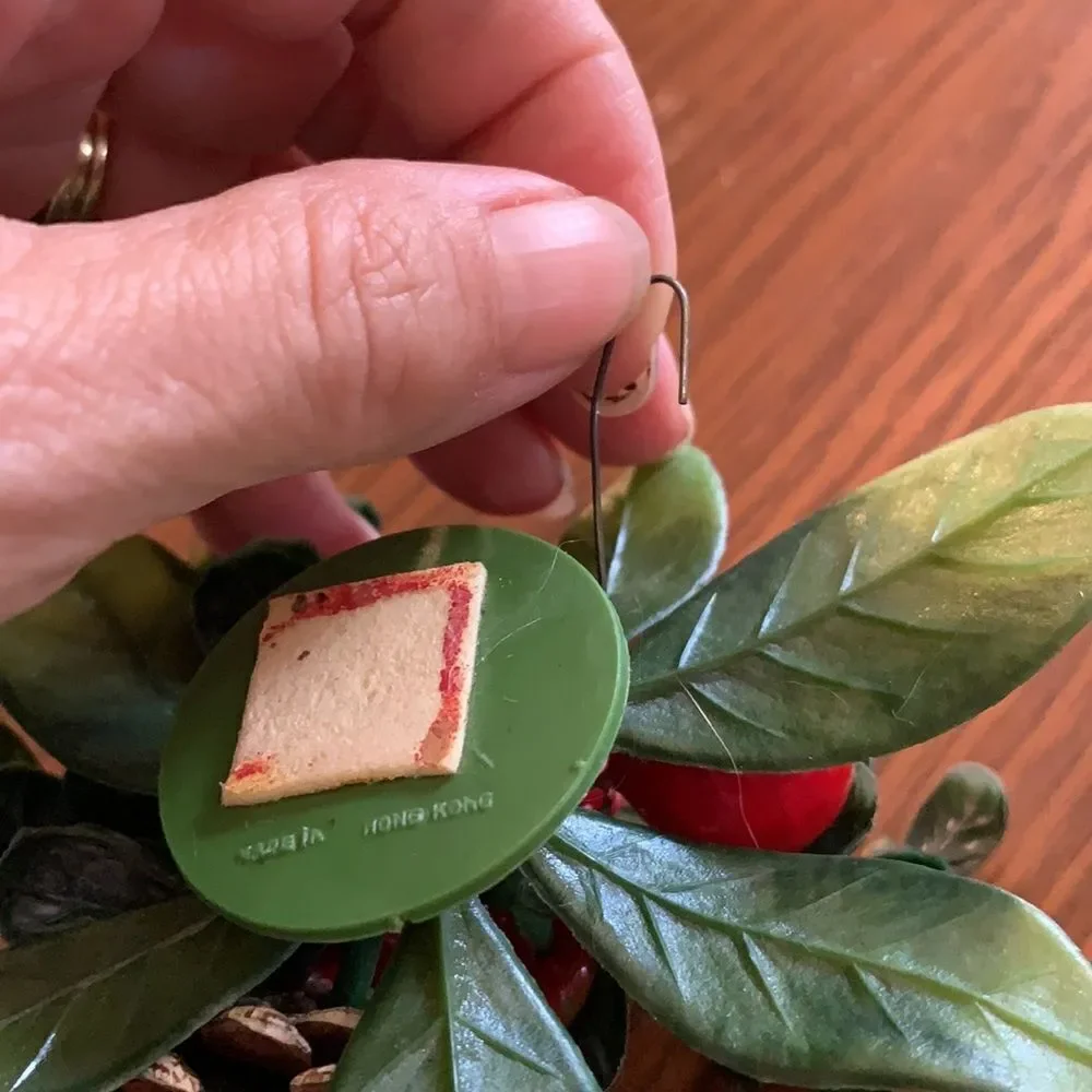 Vintage plastic Christmas corsage with pine‎ cone & holly berries